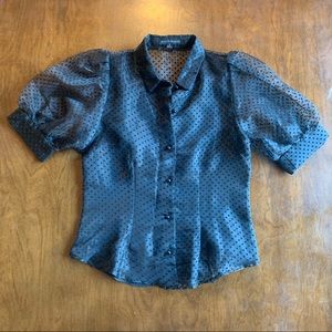 Sexy and fashionable black sheer blouse